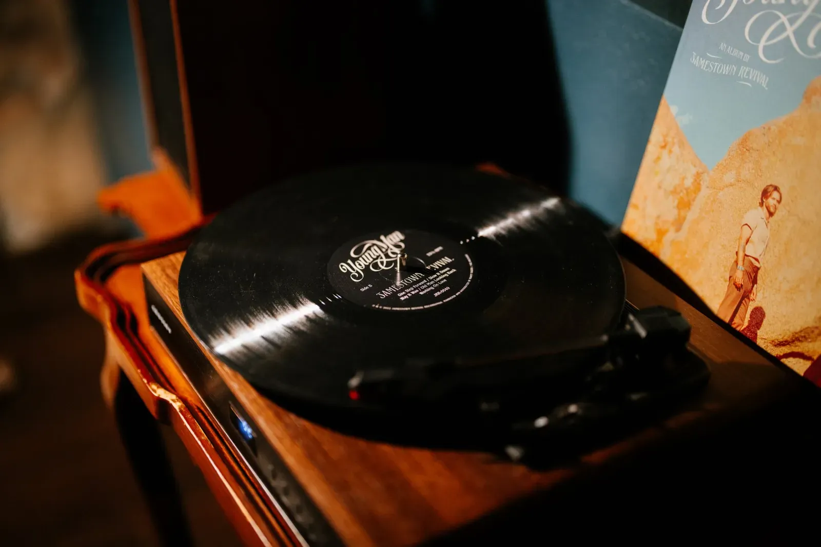 Play a vinyl record to set the mood for your mountain adventures.