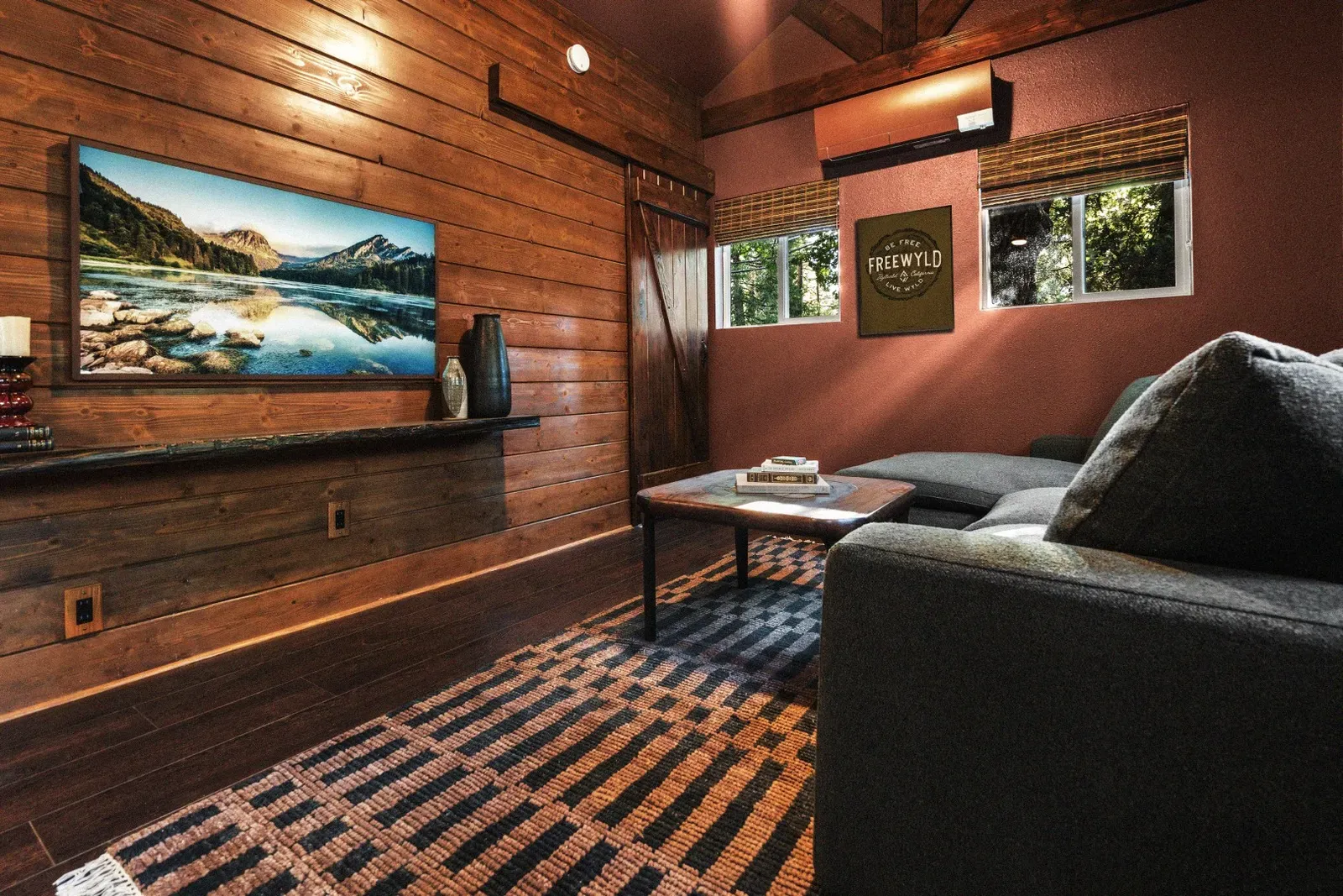 There's a Samsung Frame TV set up with a house Netflix account to watch your favorite shows.