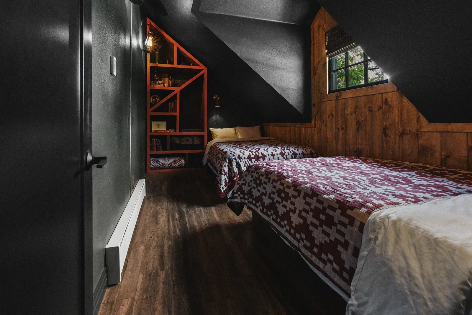 The "bunk" room in Ursus has 2 XL Full-sized beds. This room sleeps up to 4 (with smaller humans) or 2 if you prefer more room.