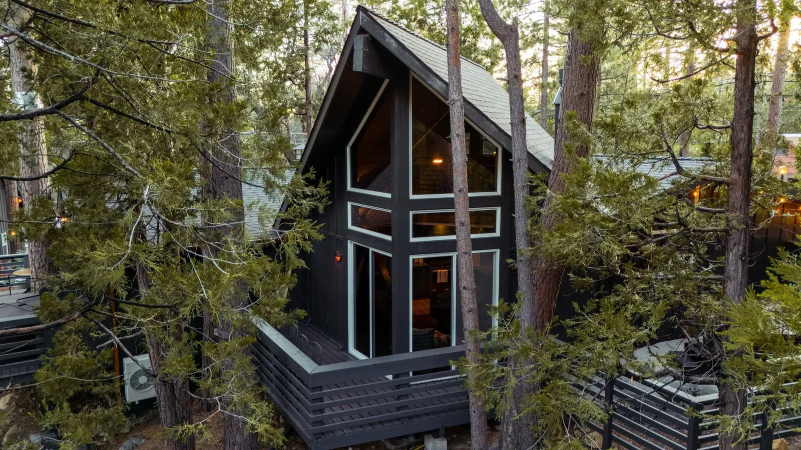 Juniper is a 2 bedroom (1 King, 1 Queen), 1 bath A-frame cabin with a single daybed in the loft. Sleeps up to 5.