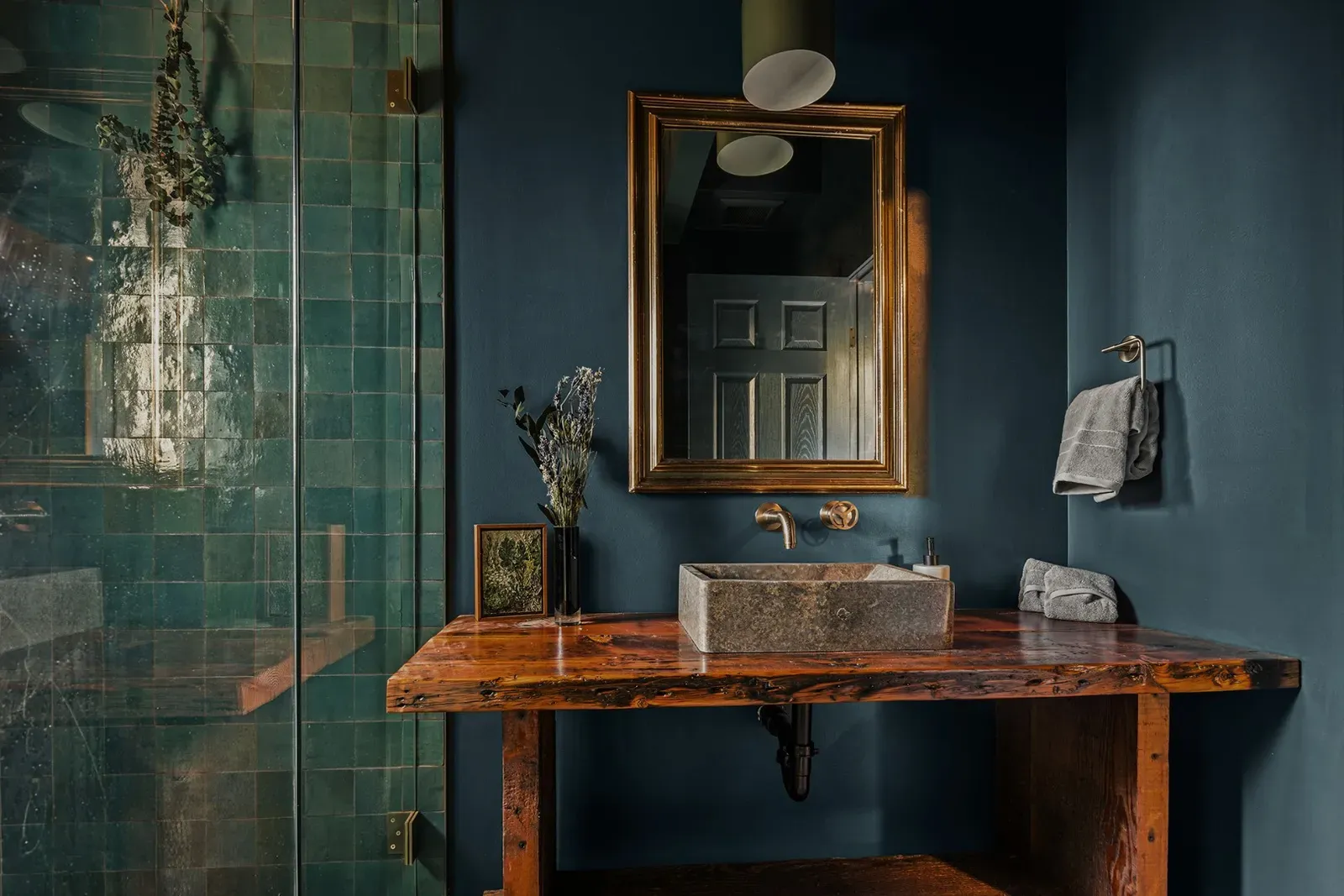 Black Mountain's teal-tiled bathroom feels like a spa retreat.