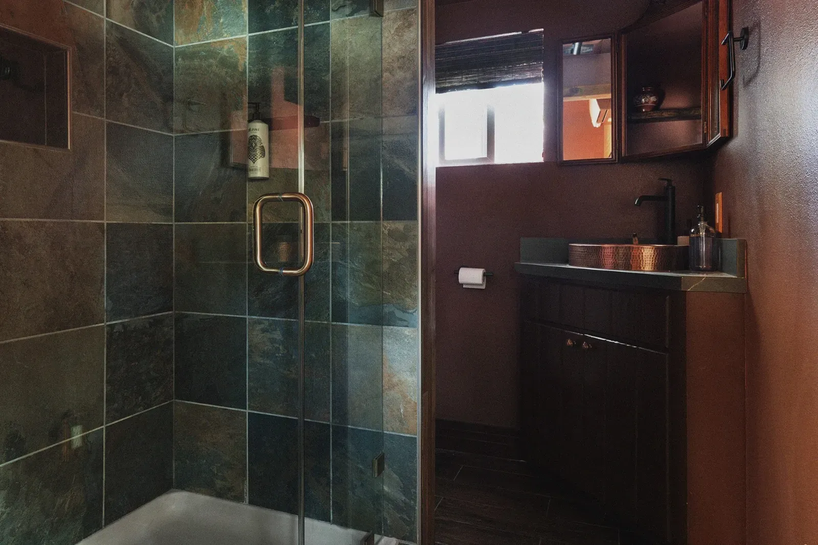 Coulter Pine has a full bathroom with a stand up tile shower and complimentary Alpine Provisions toiletries.
