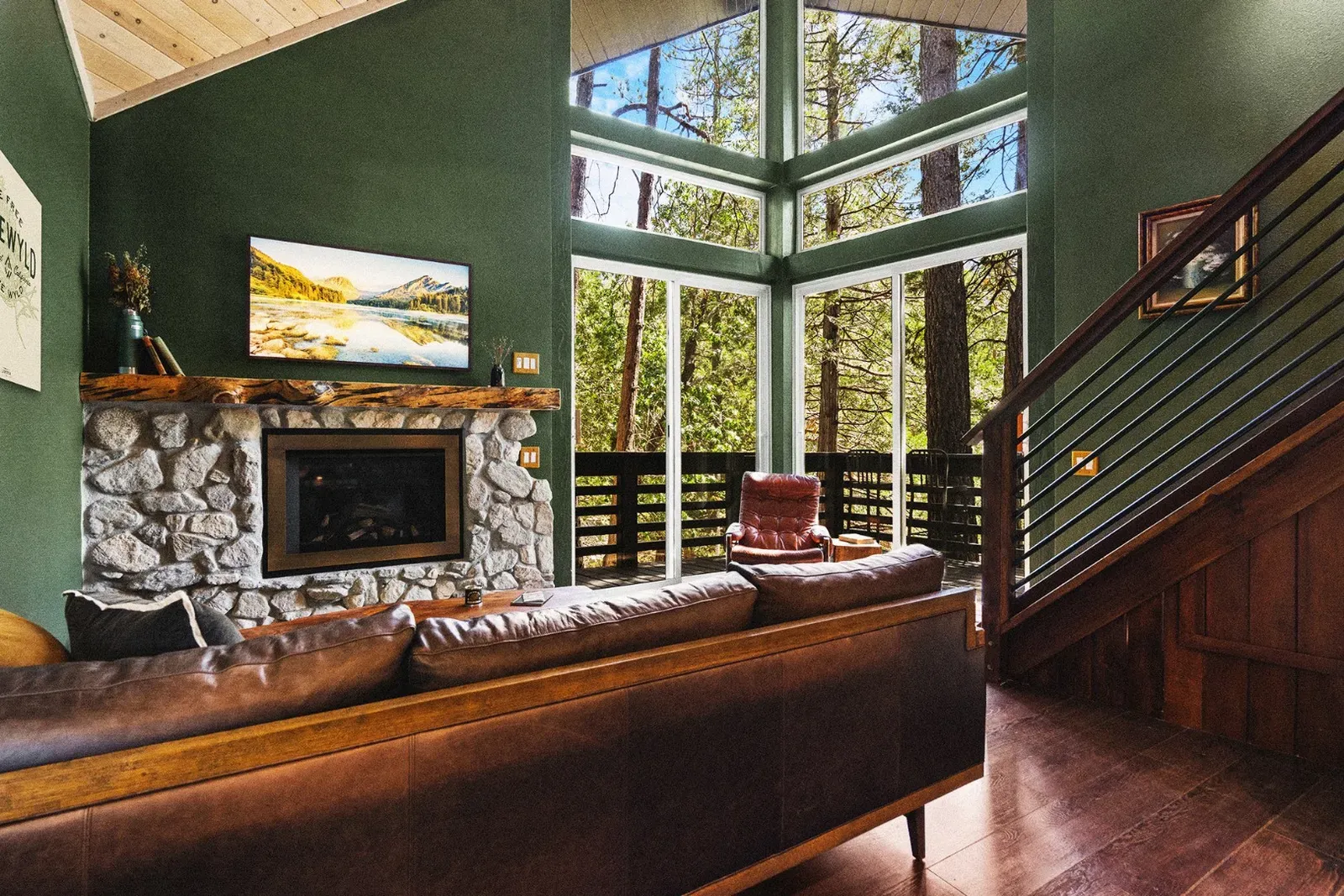 Enjoy forest views from the floor-to-ceiling A-frame windows.