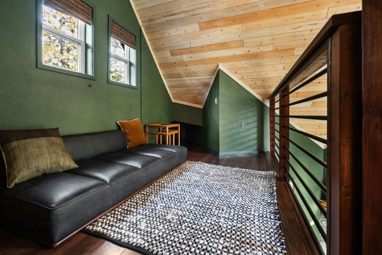 In the loft, you'll find a daybed for a 5th guest. (In addition to the 2 bedrooms downstairs)