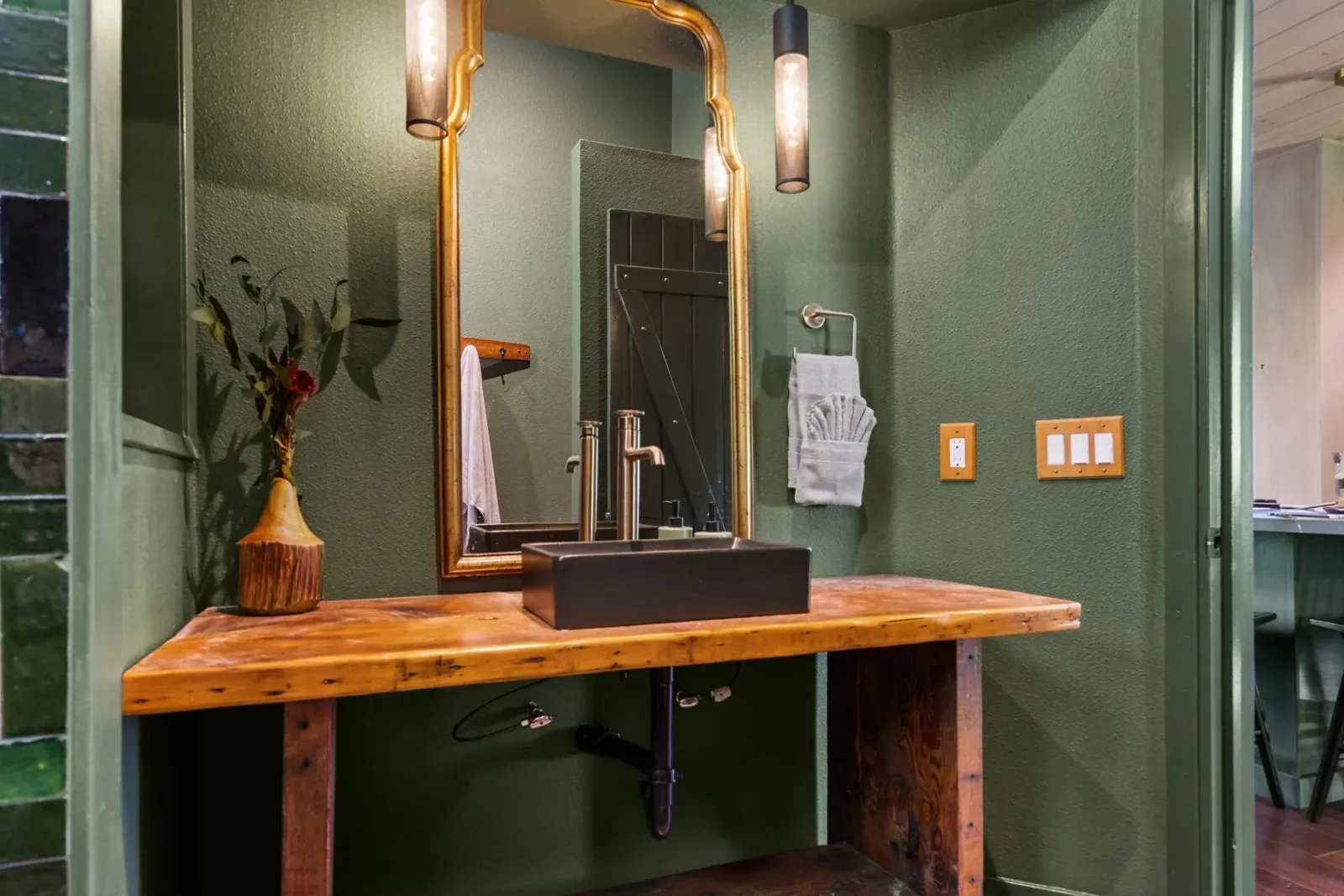 The modern rustic bathroom includes towels for your stay.