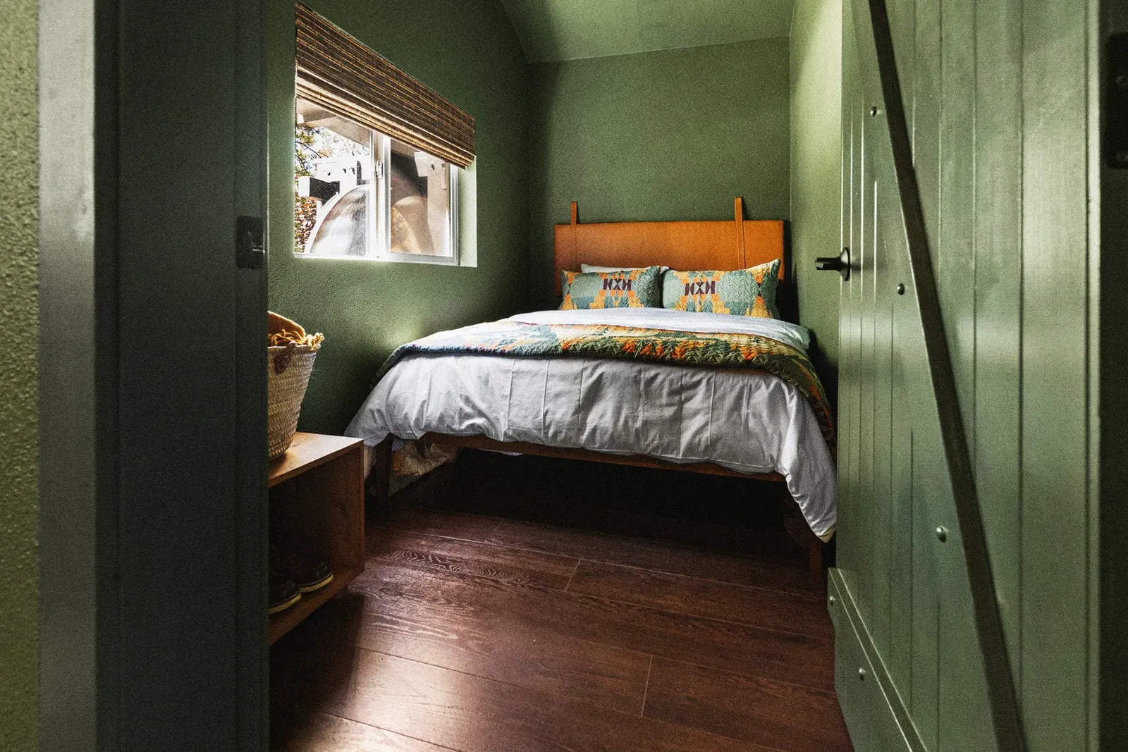 Cozy second bedroom w/ queen bed for a restful night's sleep.
