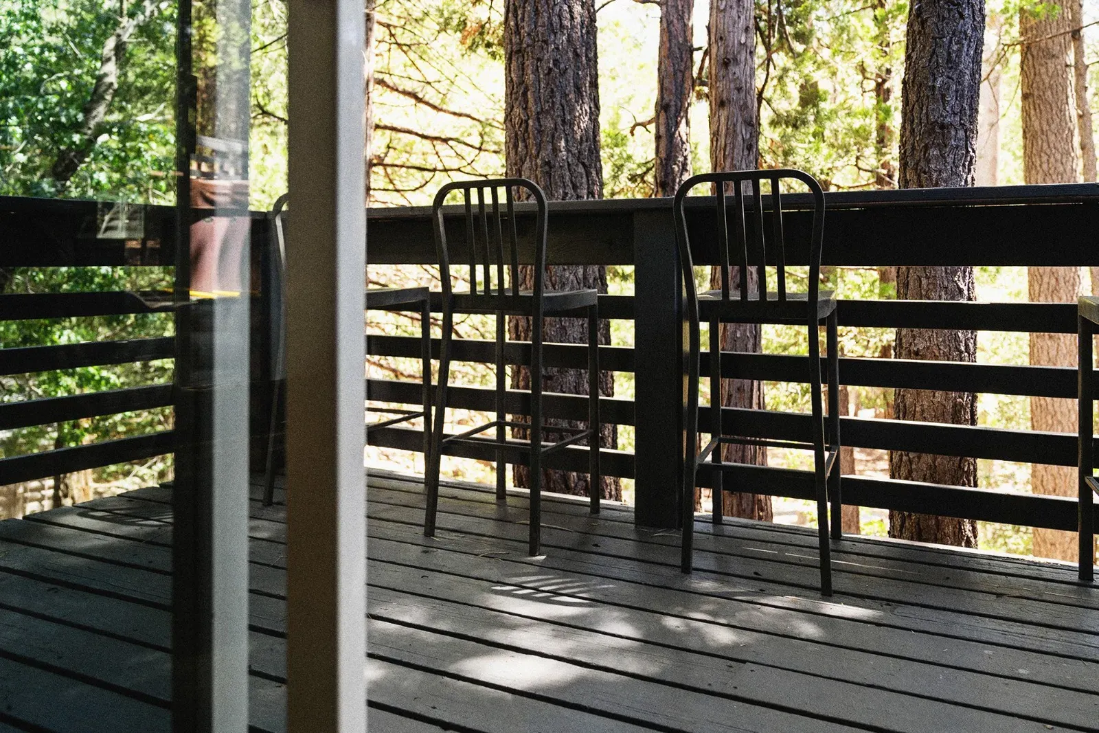 Private deck overlooking Wyldland Park for dining al fresco or simply enjoying the crisp mountain air.
