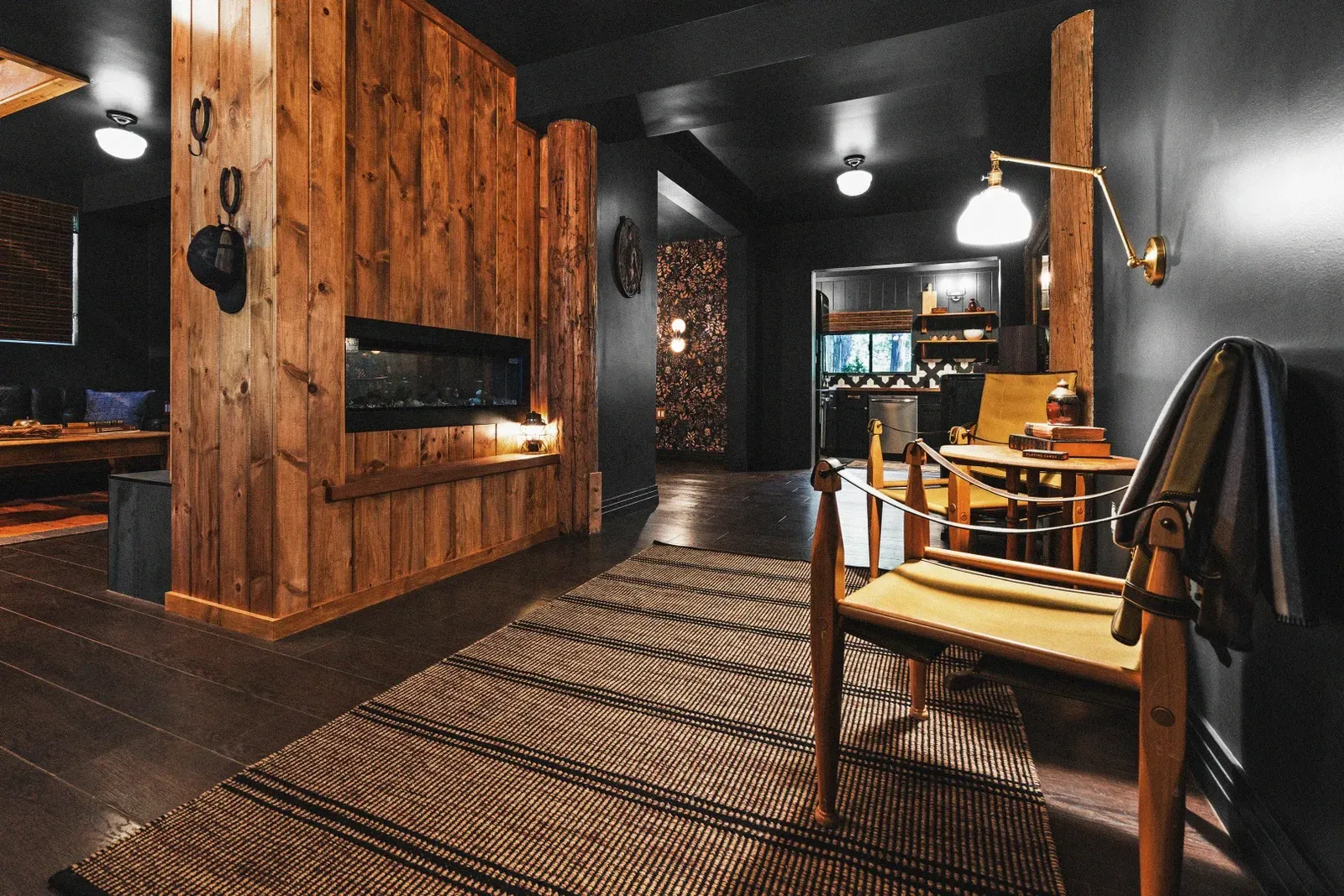 On the other side of the living area, you have a second seating area to enjoy the fireplace, sip whiskey (or tea) and relax.