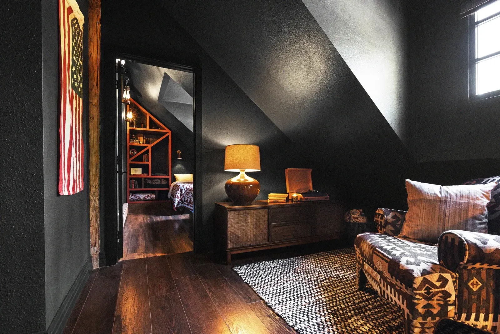The reading nook at the top of the stairs is a cozy place to find some quiet, or to enjoy vinyl records.